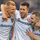 Real Salt Lake’s Aaron Herrera, Justen Glad, and Andrew Brody celebrate after their team’s victory over Sporting Kansas City.